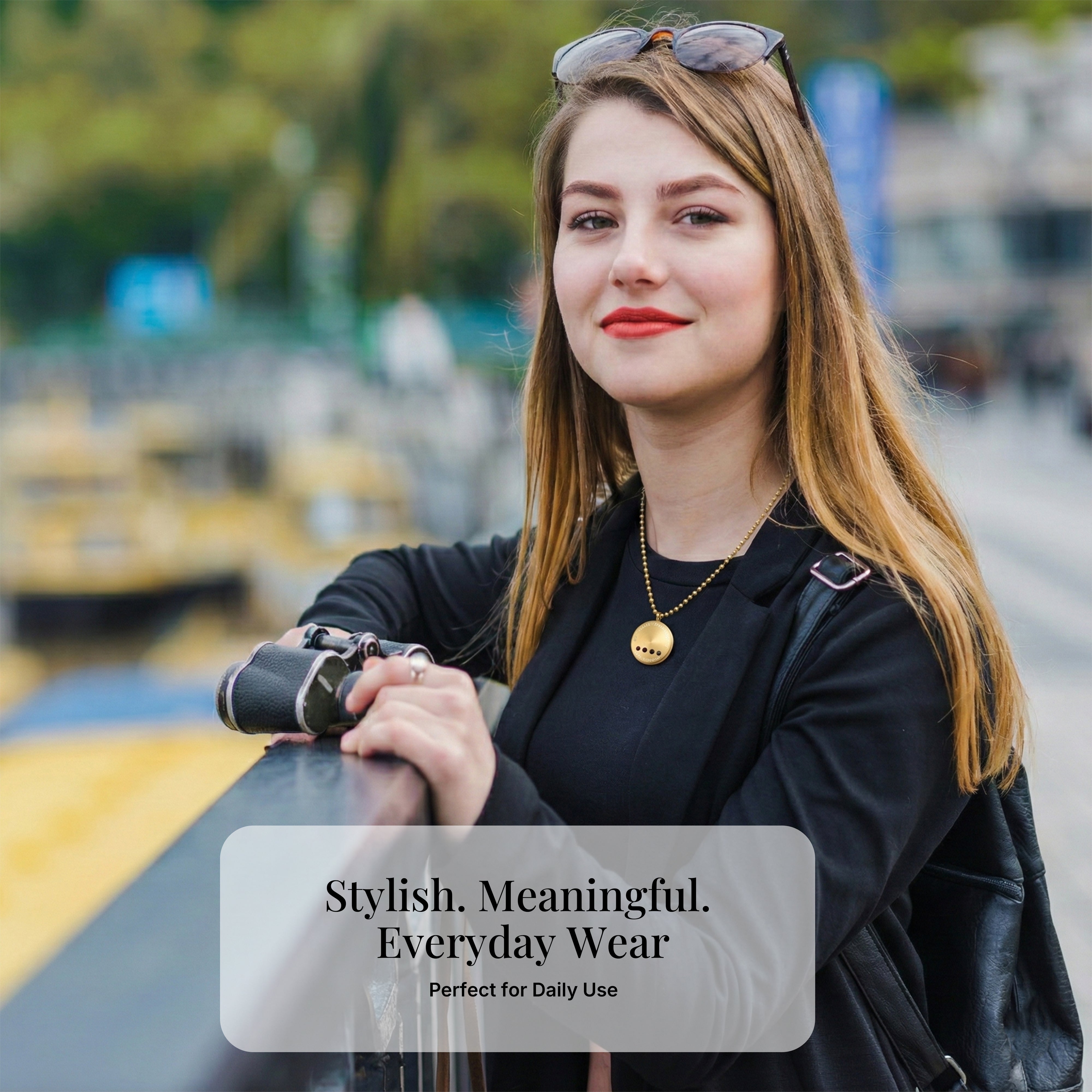 Woman wearing stainless steel energy pendant with 4 power stones for everyday use
