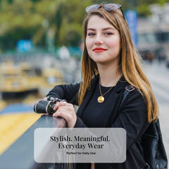 Woman wearing stainless steel energy pendant with 4 power stones for everyday use